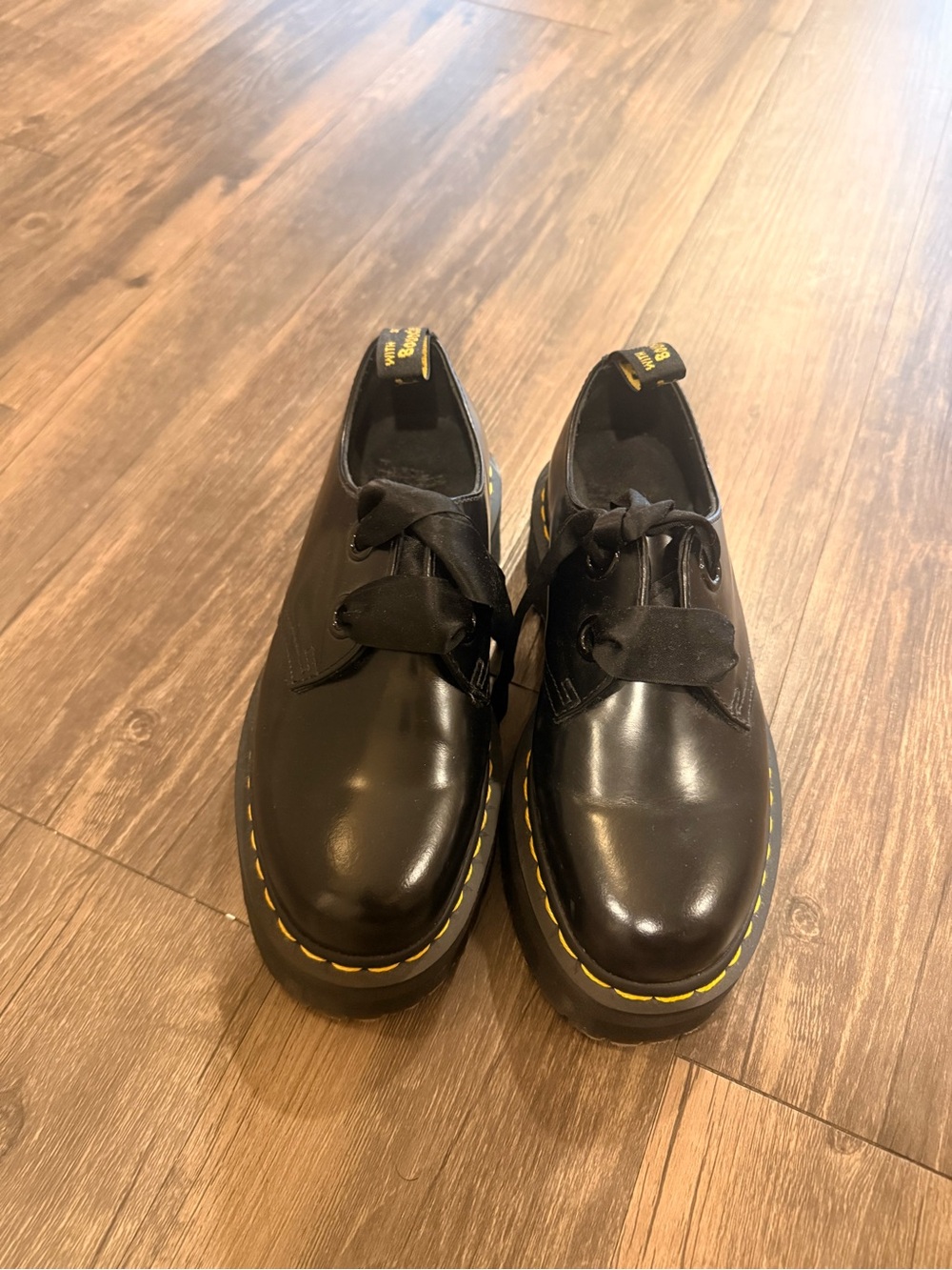 Dr. Martens Holly Black Leather Platform Shoes with Yellow Stitching